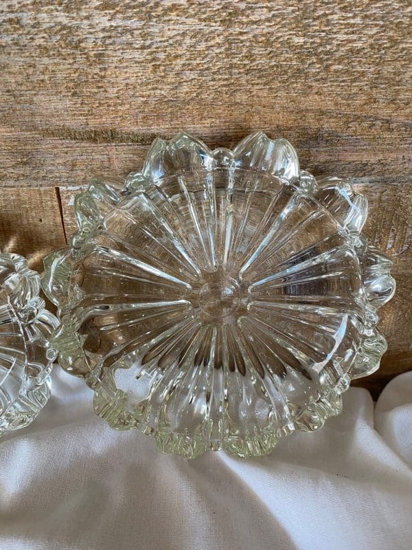 Vintage glass ashtrays set of three flower shaped close up