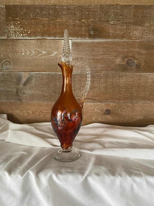 vintage amber glass decanter with applied pink flower decor