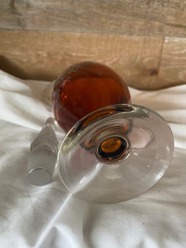 vintage amber glass decanter bottom