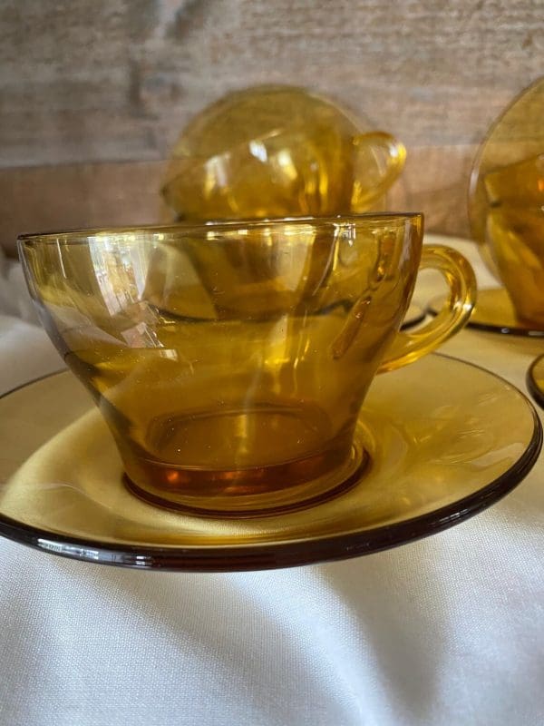 Amber glass tea cups or coffee mugs 1960s front view