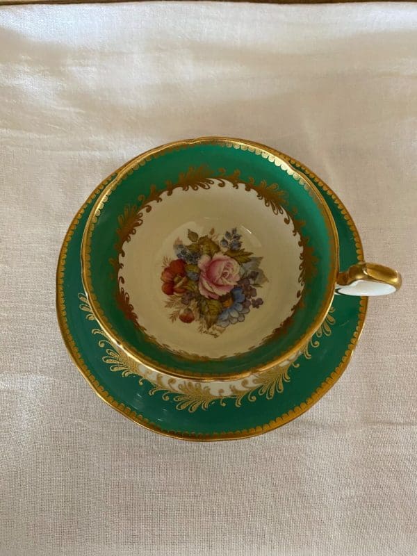 Rare aynsley tea cups Cabbage Rose signed JA Bailey top view inside of tea cup showing flowers and signature