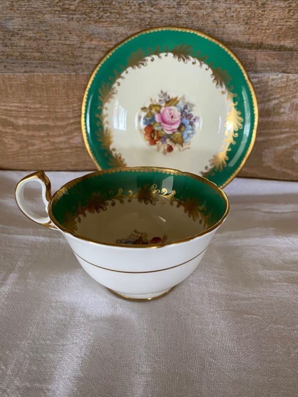 Rare aynsley tea cups Cabbage Rose signed JA Bailey straig on view showing white outside