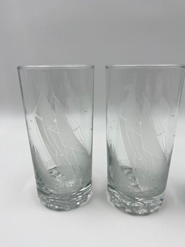 nautical drinking glasses two next to each other ship etched