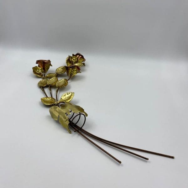 vintage brass wall decor roses laying flat