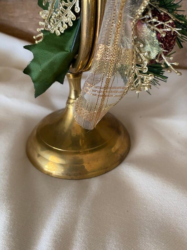 brass French horn candle holder close base