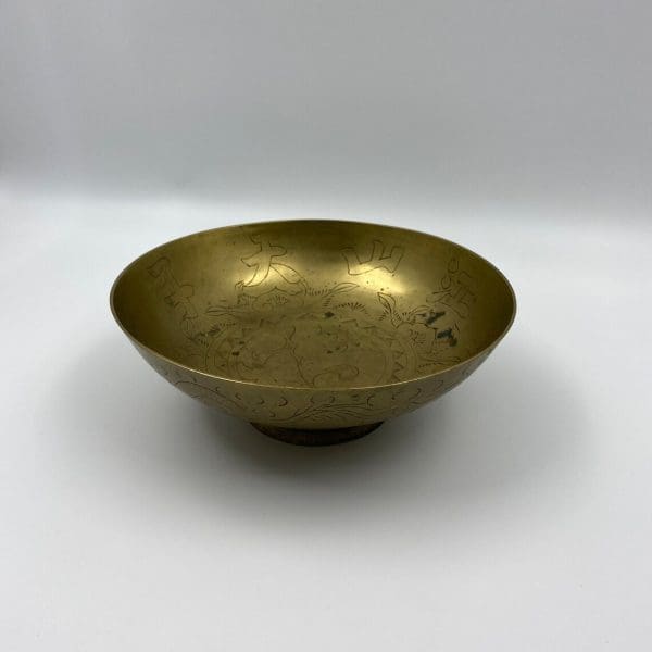 Chinese brass dragon bowl front view showing some of the detail inside