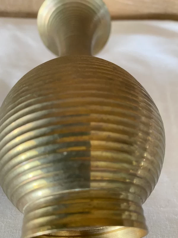 brass flower vase texture close up view