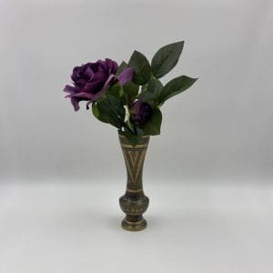 black and brass vase with flowers