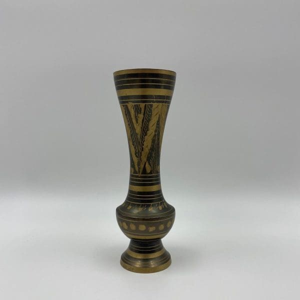 black and brass vase side