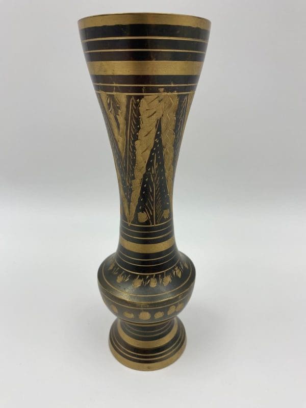 black and brass vase detail