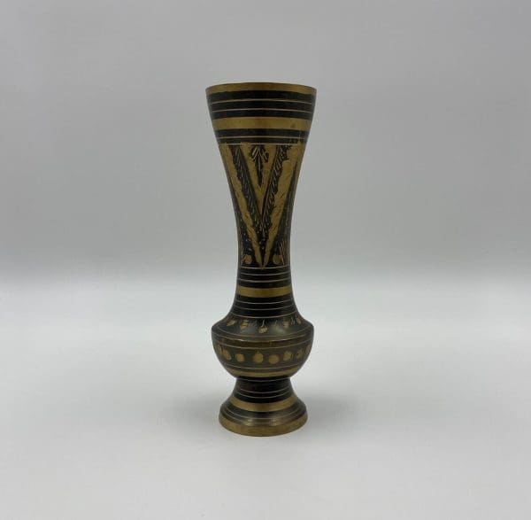 black and brass vase etched detail