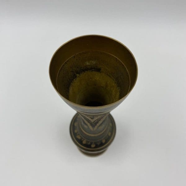 black and brass vase inside top