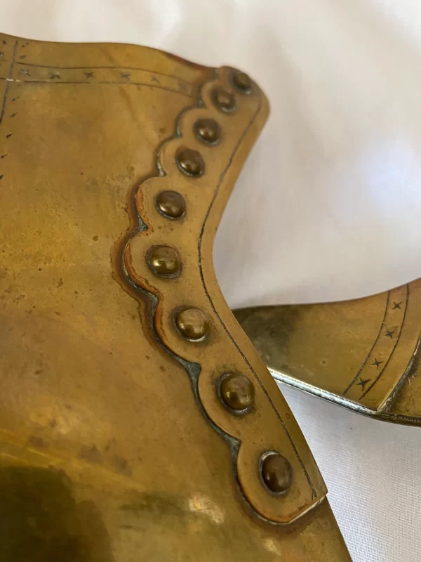 Victorian brass shoe vases close up