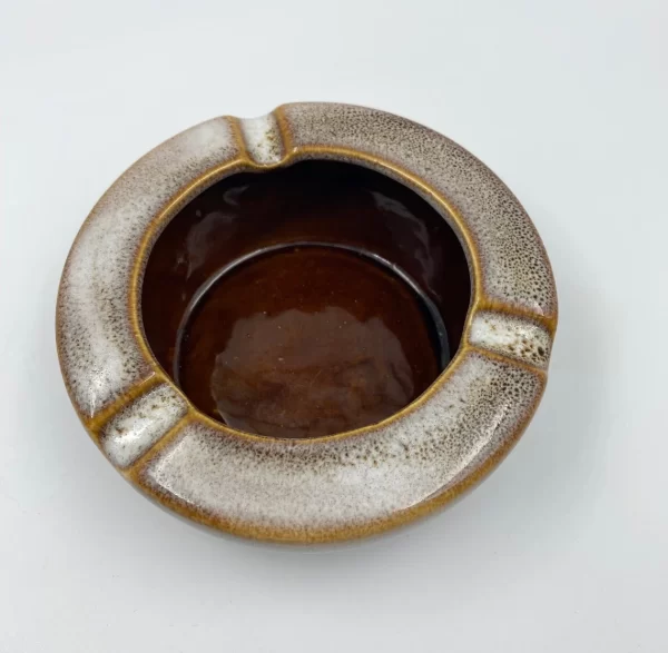 vintage ceramic ashtrays inside brown glaze