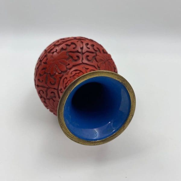 red cinnabar vase top