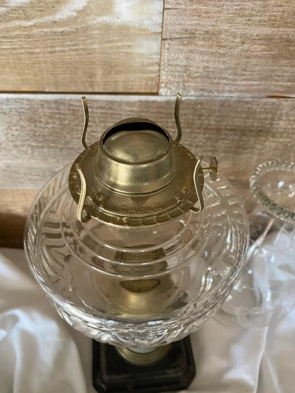 antique oil lamp with cast iron base brass burner