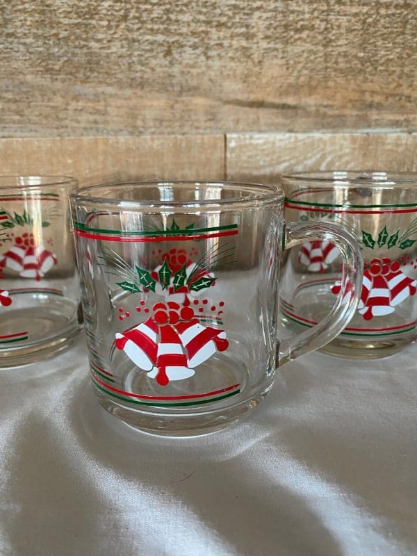 clear glass Christmas mugs close