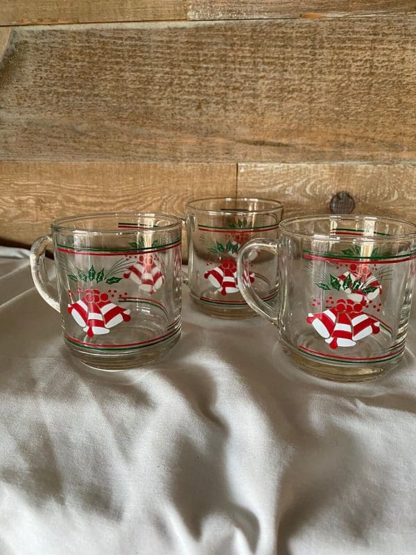 clear glass Christmas mugs trio