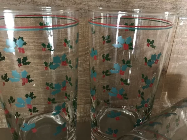 Christmas glass tumblers close detail of holly red and green