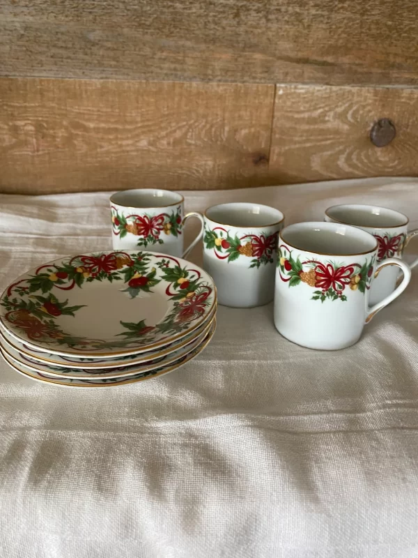 Christmas demitasse cups stacked saucers