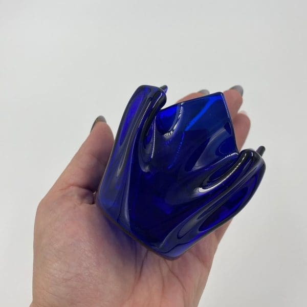 blue handkerchief vase in hand showing size