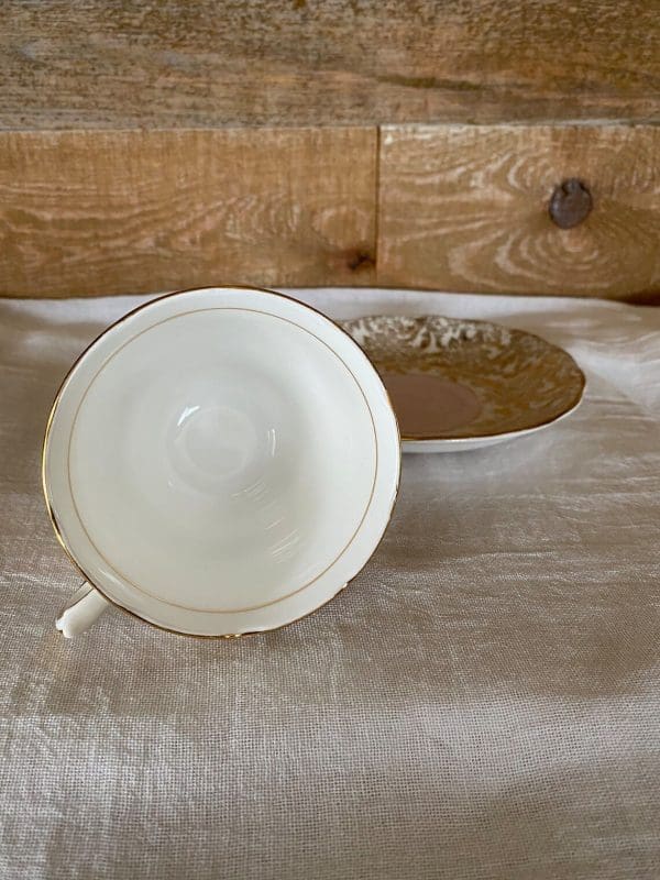 Colclough china tea cup pink, white and gold floral inside of tea cup