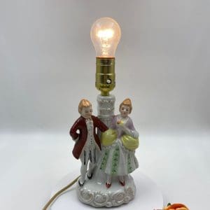 vintage porcelain figurine lamps front Victorian man and woman porcelain lamp