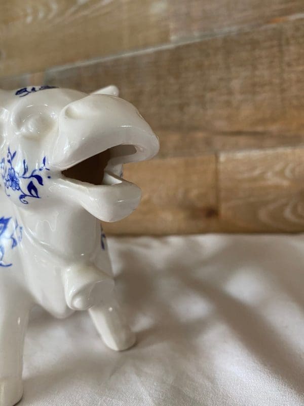 vintage cow creamer spout mouth