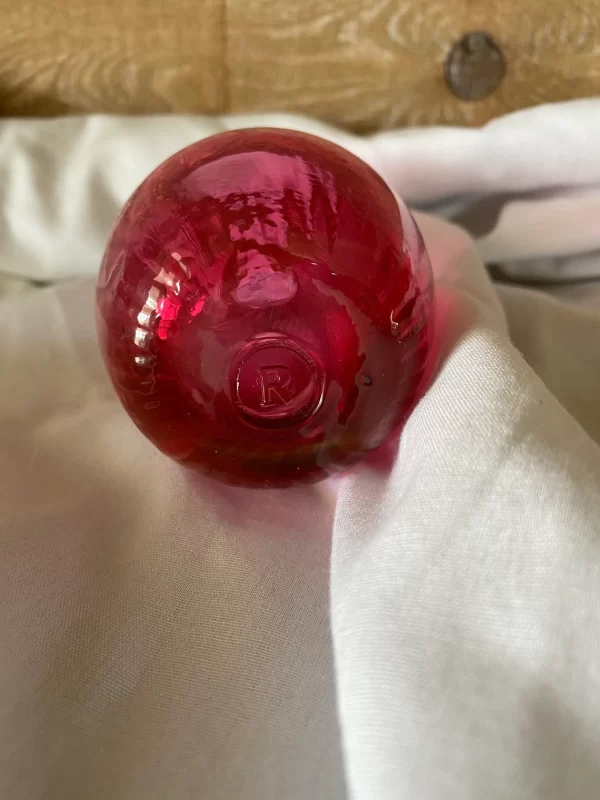 Rossi cranberry glass vase bottom