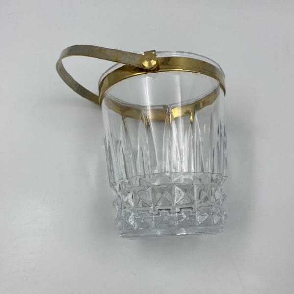 Cristal d'Arques ice bucket laying on side gold handle