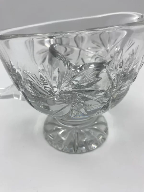 crystal gravy boat close to show pinwheel design