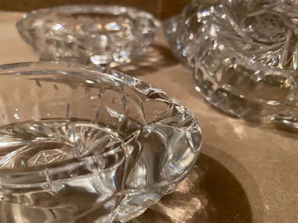 Pinwheel crystal ashtrays vintage set of four zoomed in