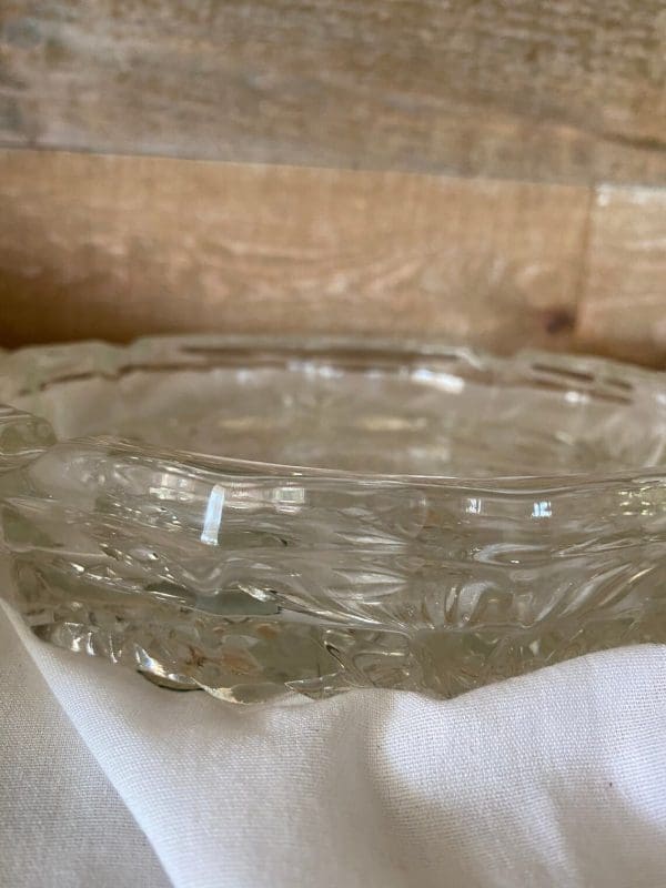 Vintage round glass ashtray side view