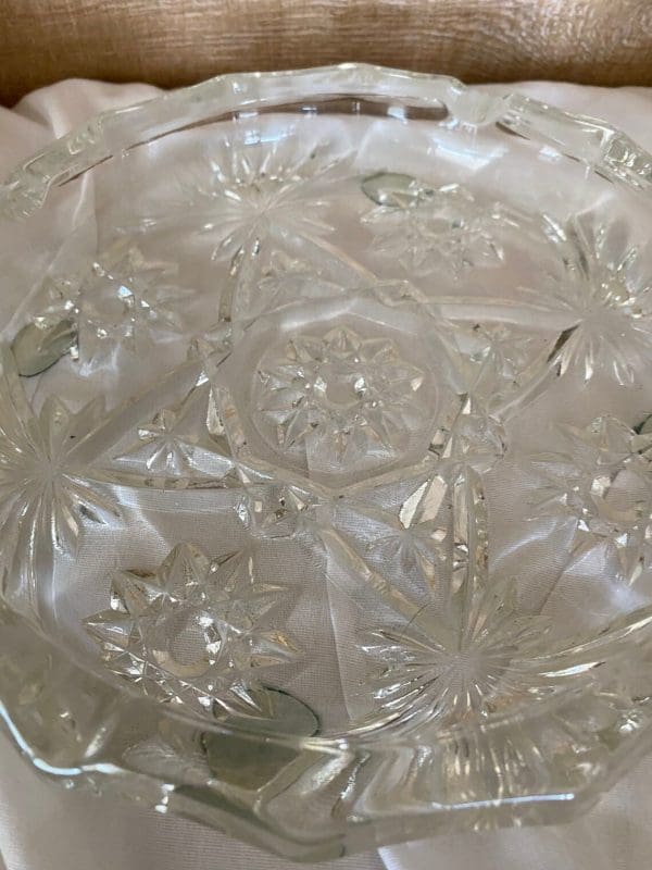 Vintage round glass ashtray close up