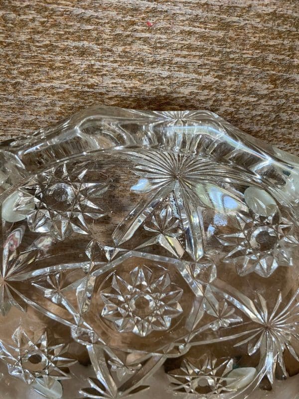 Vintage round glass ashtray zoomed in three