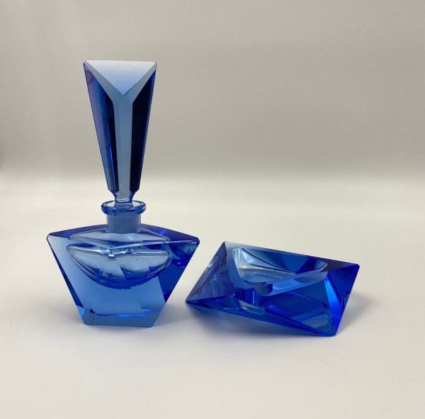 blue crystal perfume bottle with trinket dish front