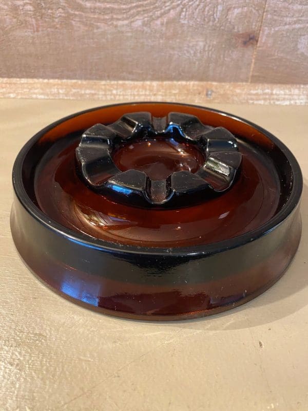 Vintage glass cigar ashtray dark amber, round