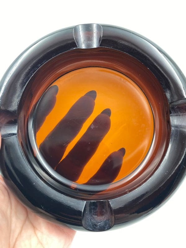 best cigar ashtray in hand held in light to show color and size