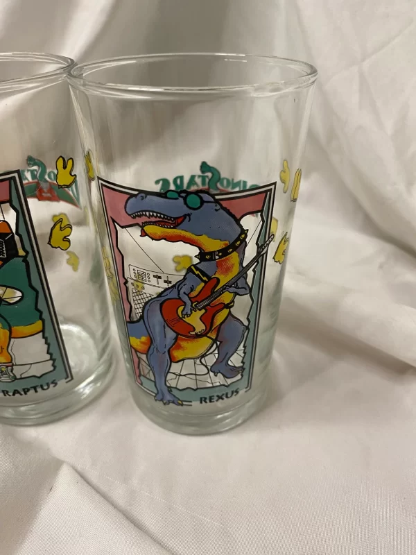 dinosaur drinking glasses front of two