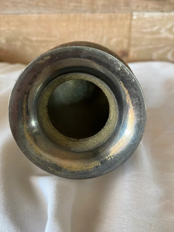 etched brass vase from India top while on side