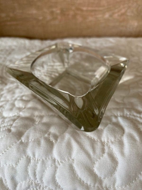 diamond shaped glass ashtray closeup