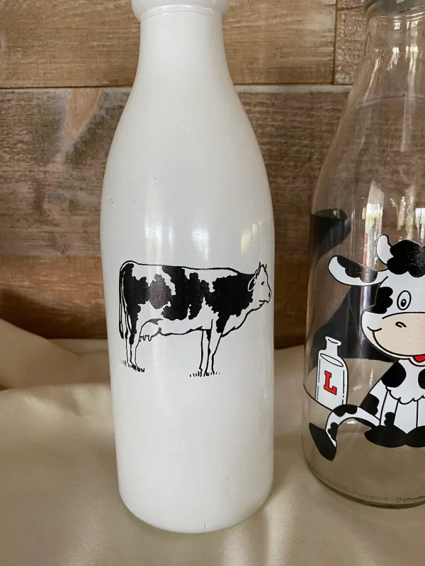 decorative milk bottles jersey cow on white milk glass