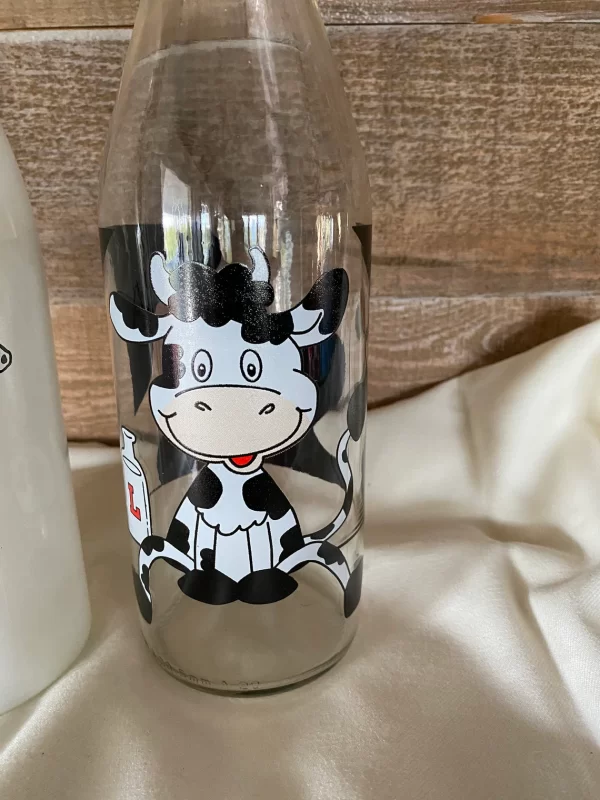 decorative milk bottles cartoon cow on clear glass