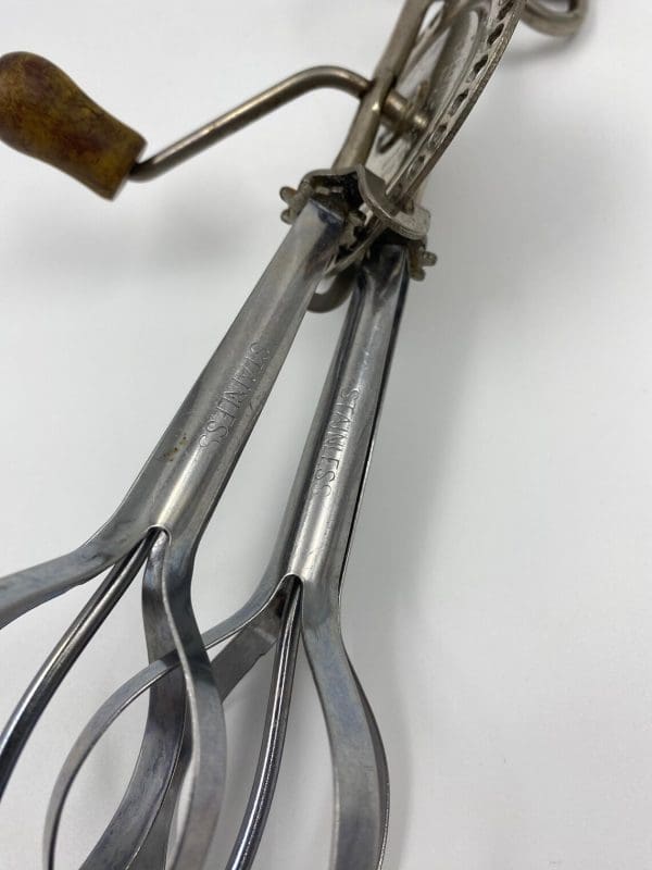 vintage egg beater embossed showing stainless steel