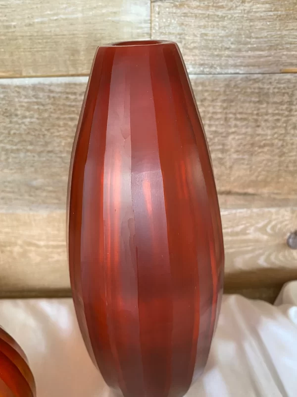 red cut glass vase close tall