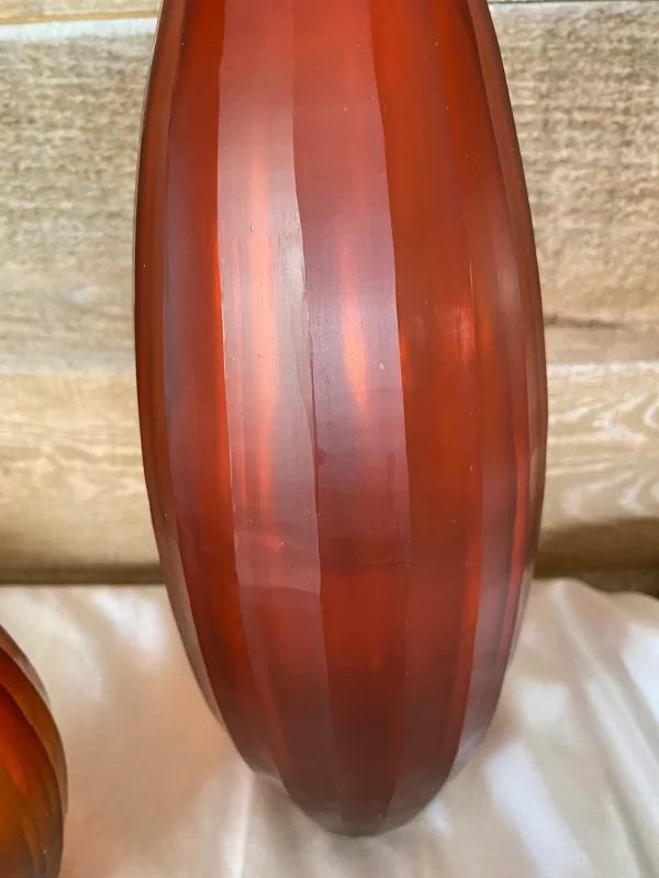 red cut glass vase detail tall