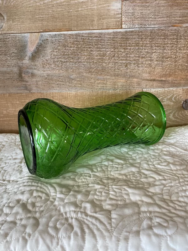 green hoosier glass vase laying side