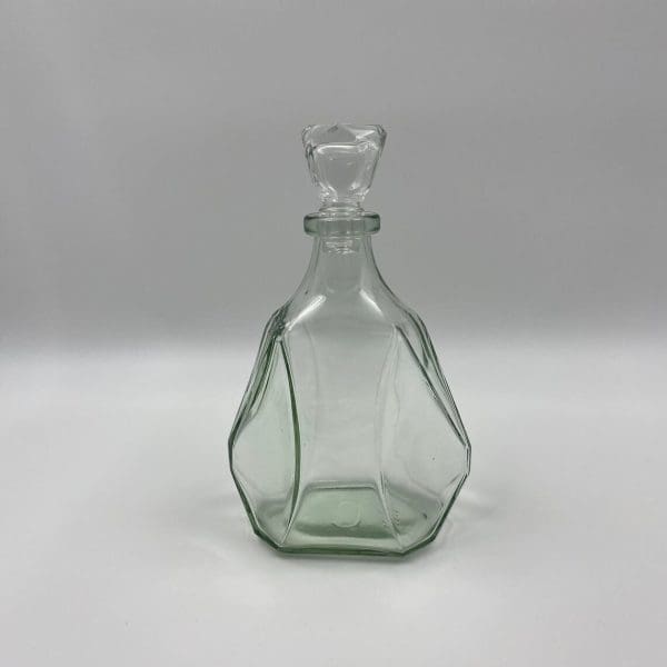 vintage whiskey decanter front clear green tinted glass in an ice block shape