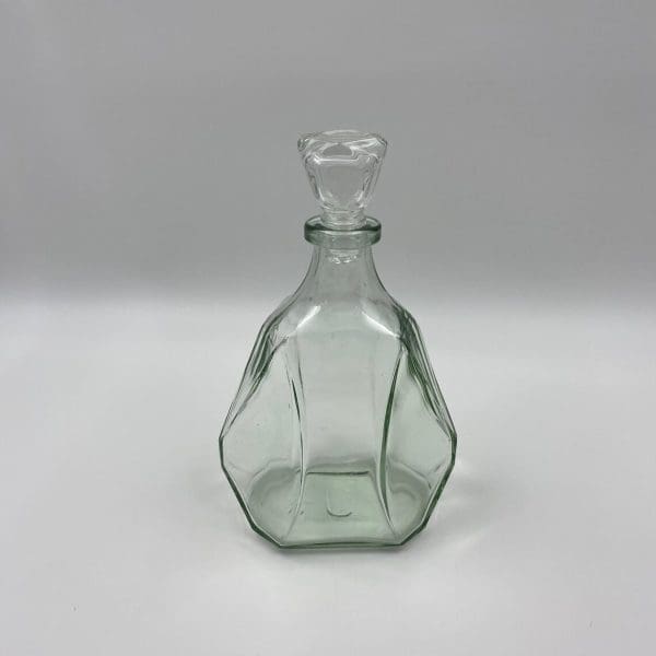 vintage whiskey decanter back showing off the tinted glass