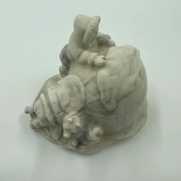 carved soapstone figurines top view